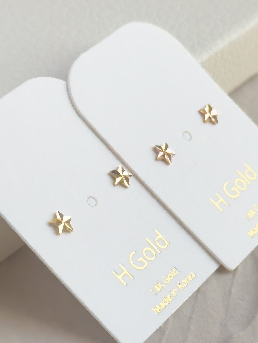 14k Gold Faceted Star Earrings