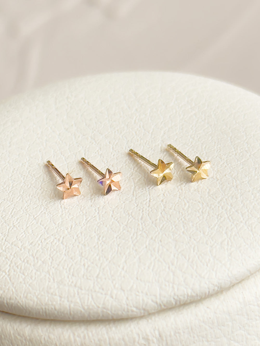 14k Gold Faceted Star Earrings