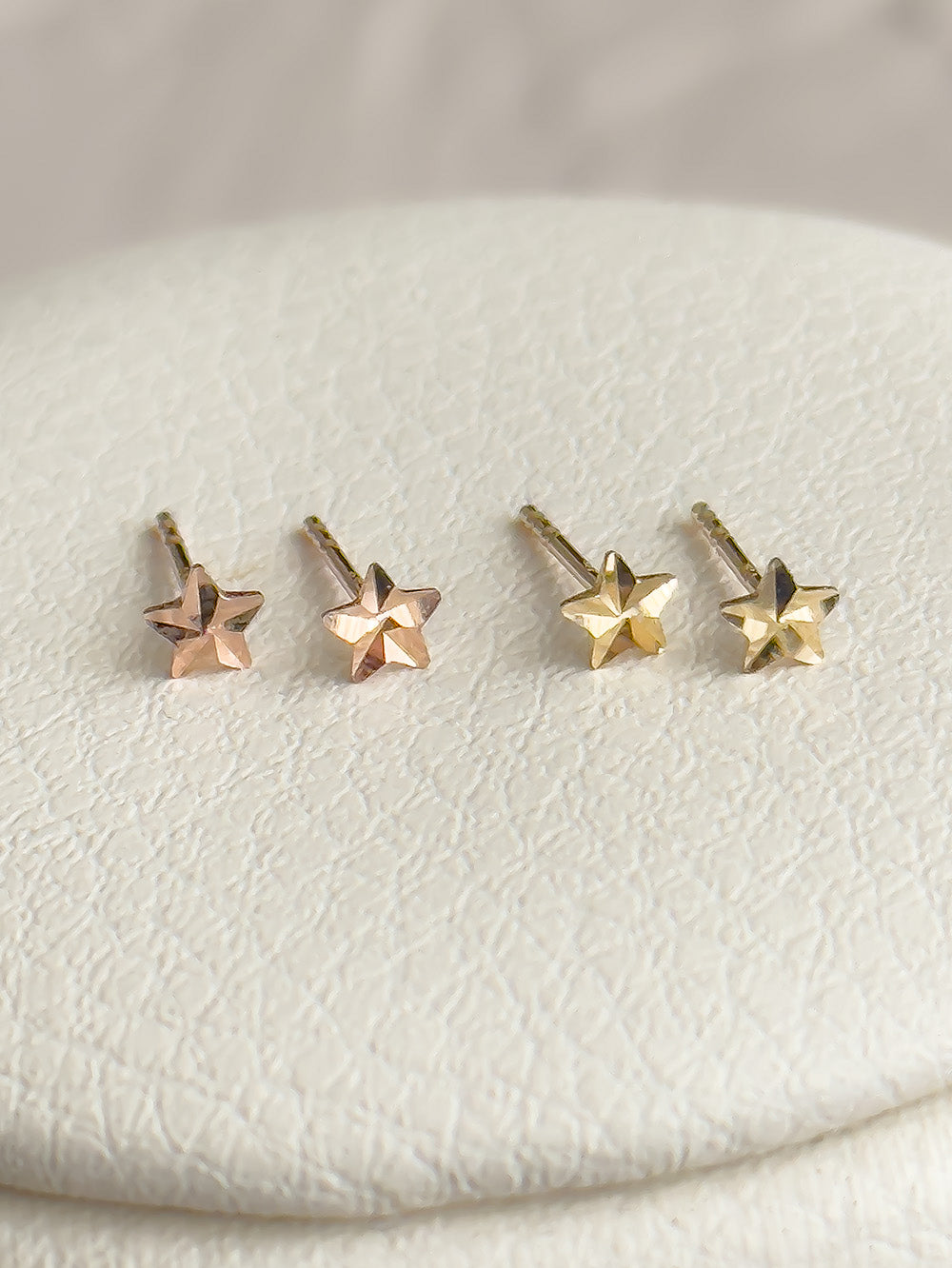 14k Gold Faceted Star Earrings