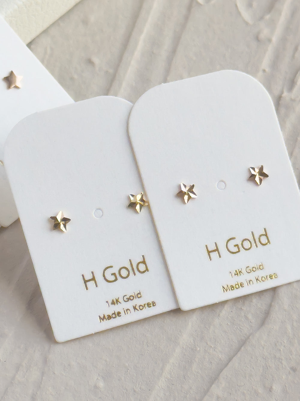 14k Gold Faceted Star Earrings